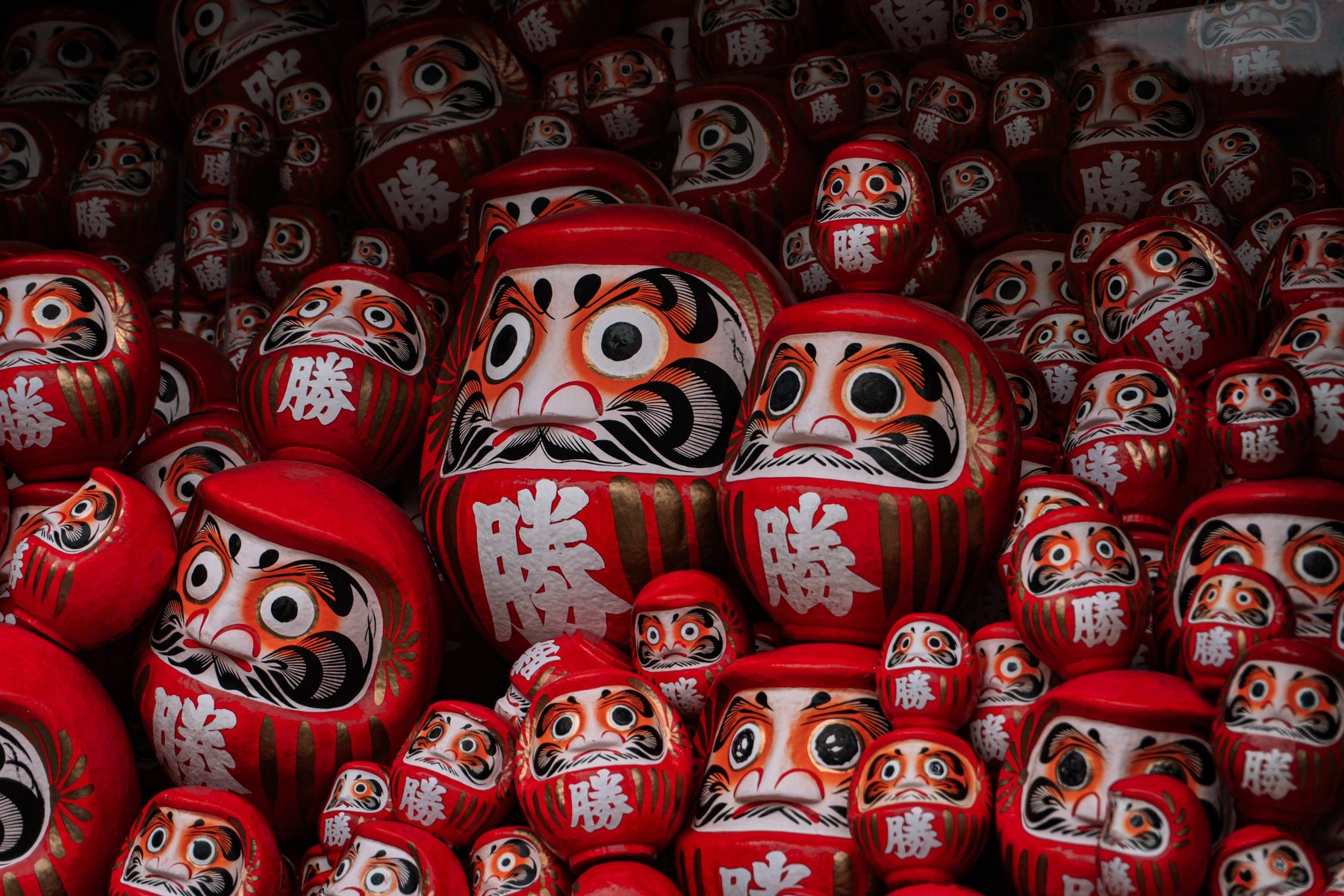 A close view of red daruma dolls at Katsuoji Temple, Osaka.